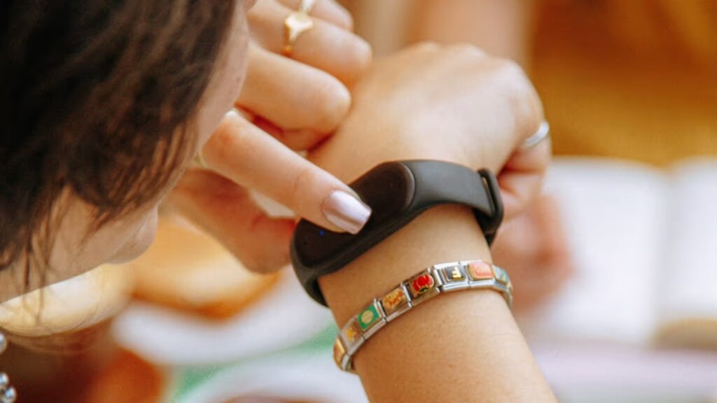 up-close view of the bee ai wearable on a woman