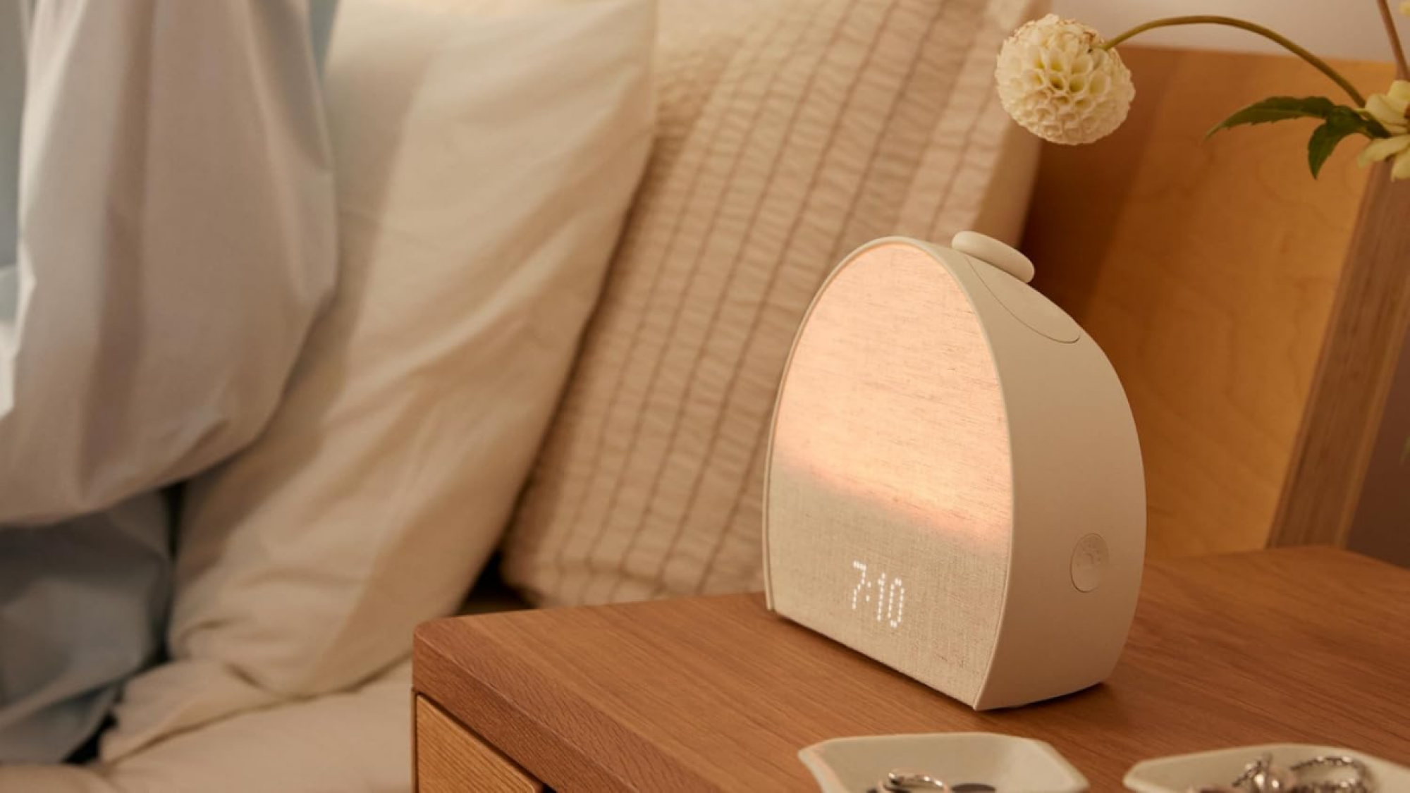 lit-up Hatch Restore 3 alarm clock on a night stand