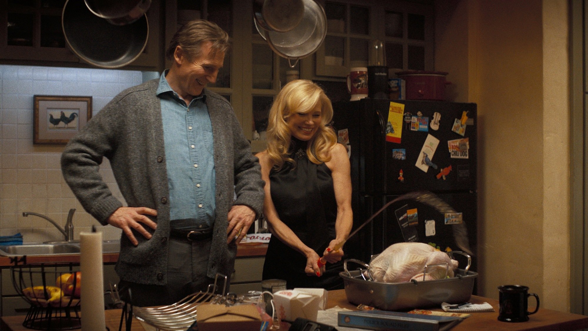 Pamela Anderson plays Beth Davenport and Liam Neeson plays Frank Drebin Jr. in "The Naked Gun" from Paramount Pictures.