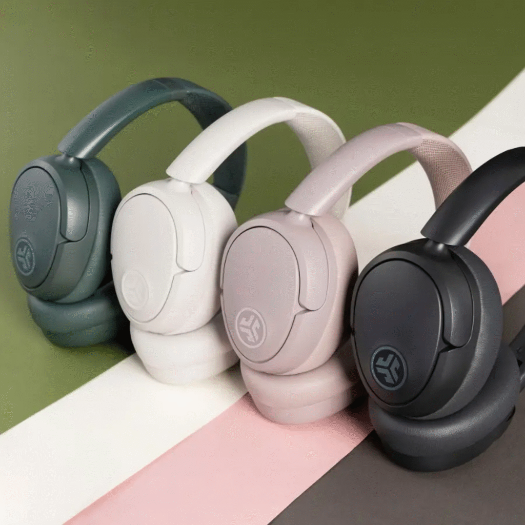 the sage jlab jbuds lux anc headphones on a wooden surface