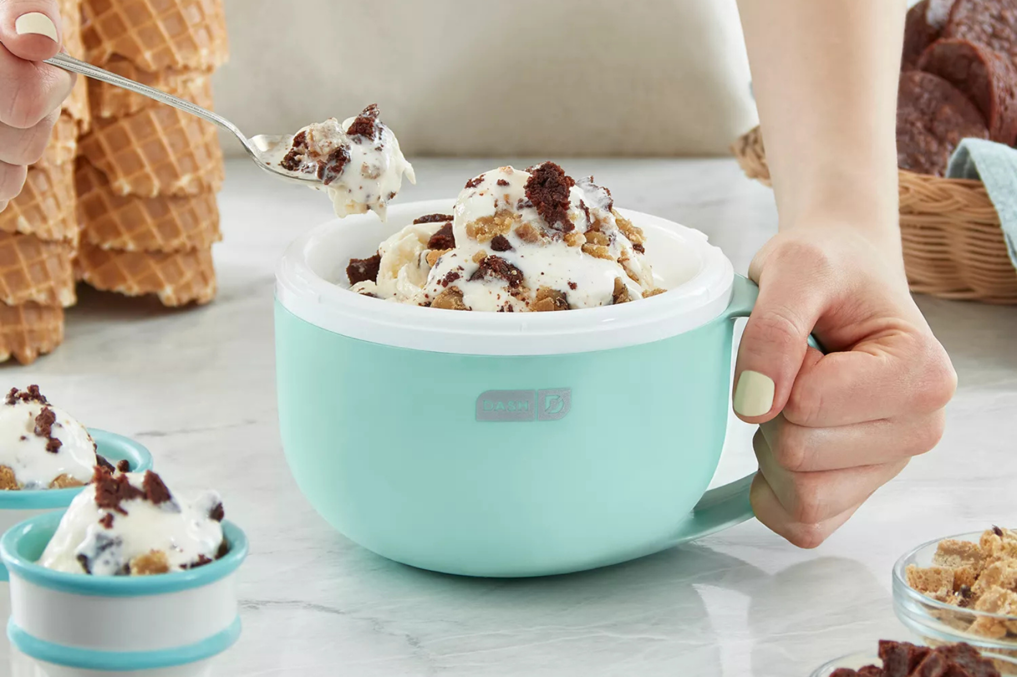 Person eating ice cream out of Dash mug ice cream maker