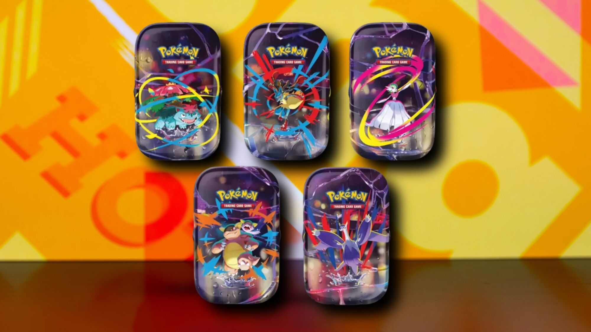 Mega Evolutions mini tins on an orange patterned background