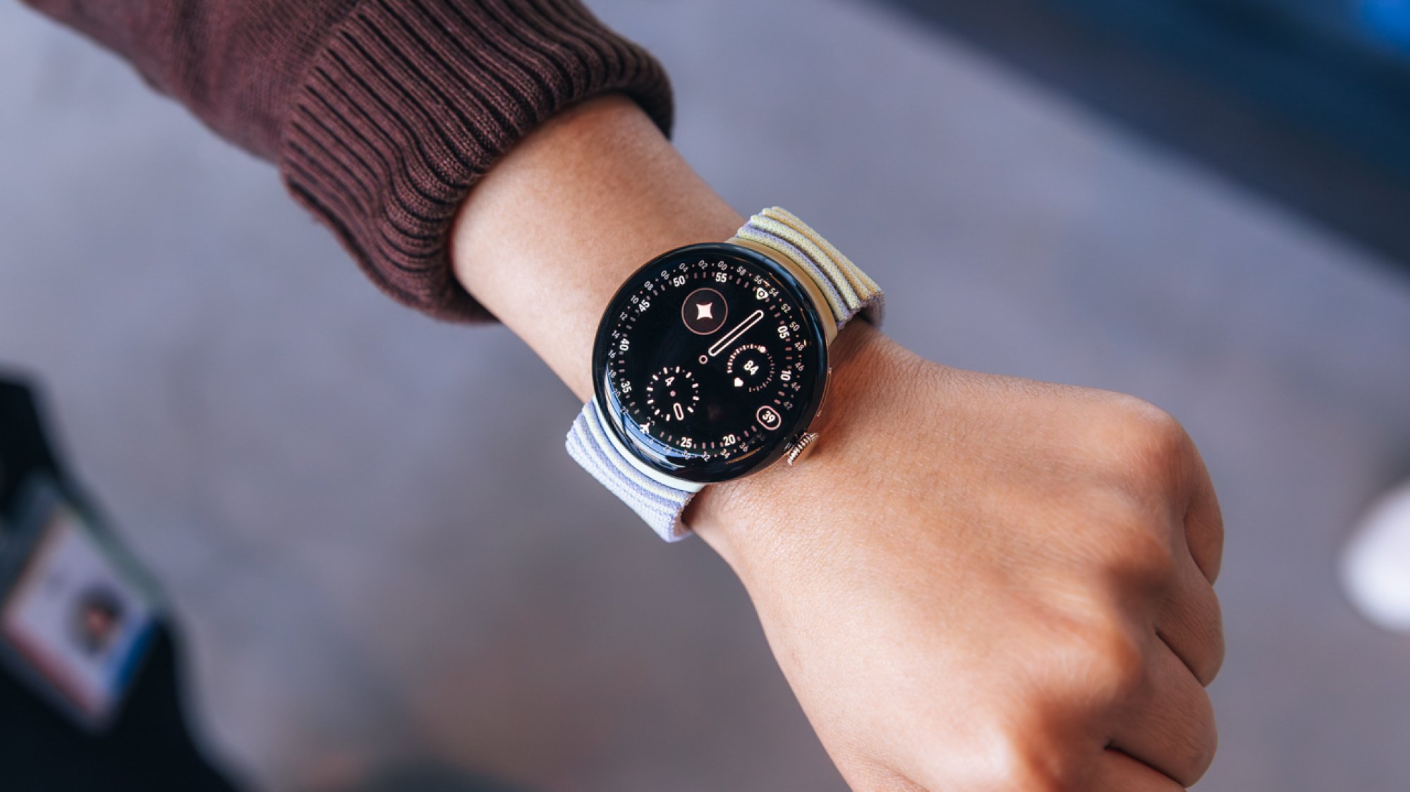 Someone wearing a Google Pixel Watch 4 on their wrist