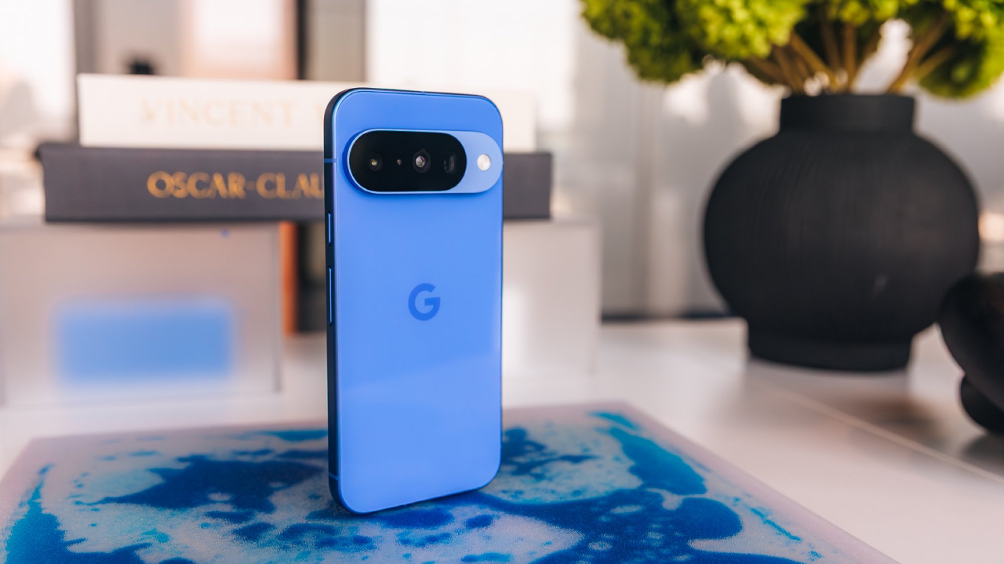 Google Pixel 10 in indigo on a table