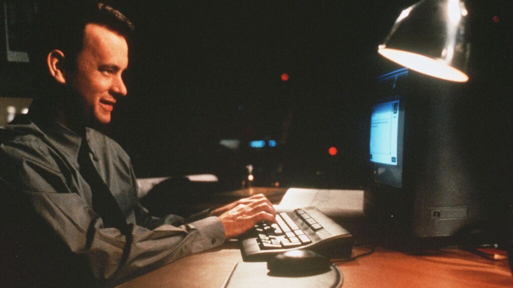 Victoria Beckham with a computer at AOL in New York on March 14, 1997.
