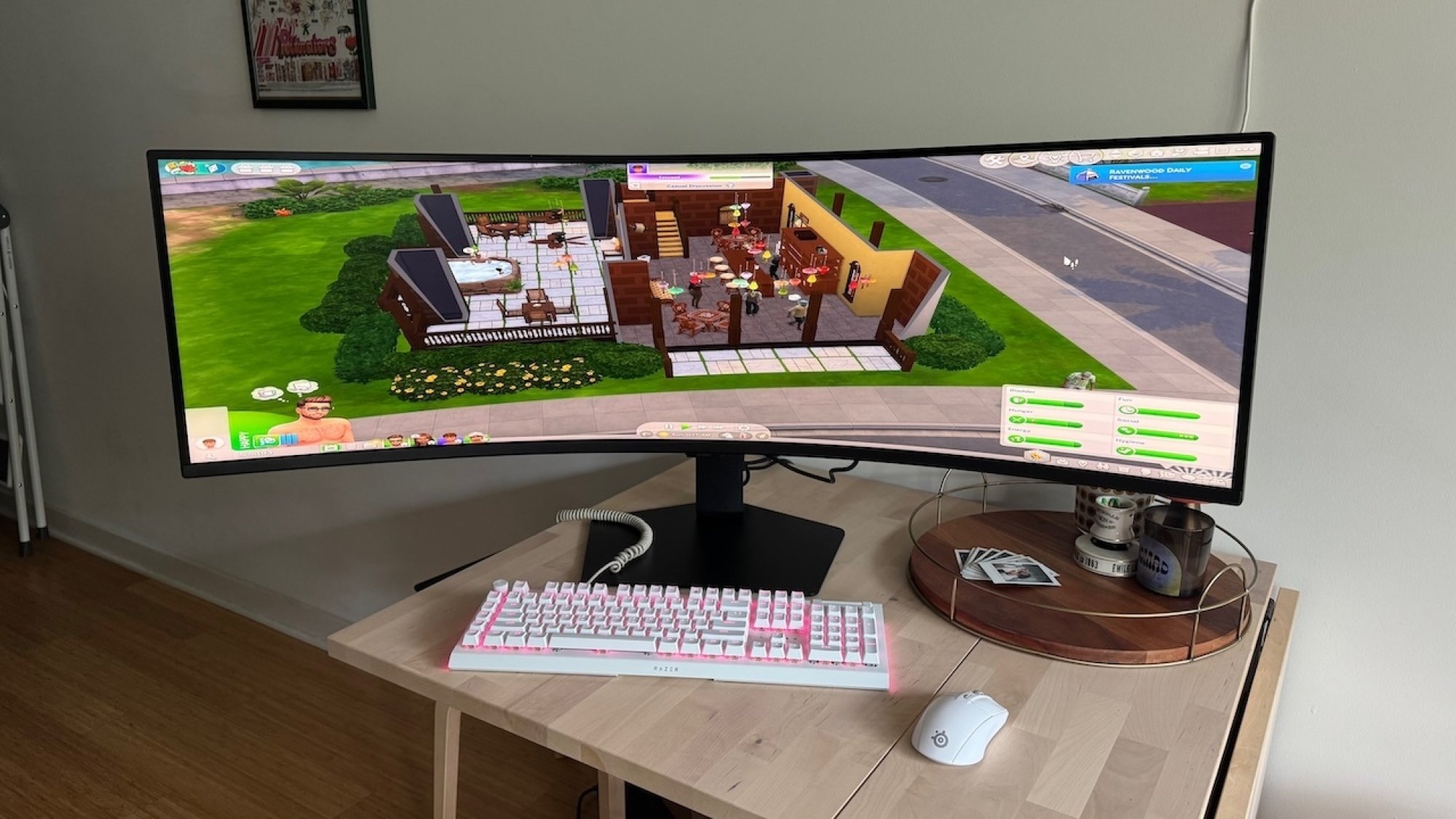 the Samsung Odyssey G95C on a small desk