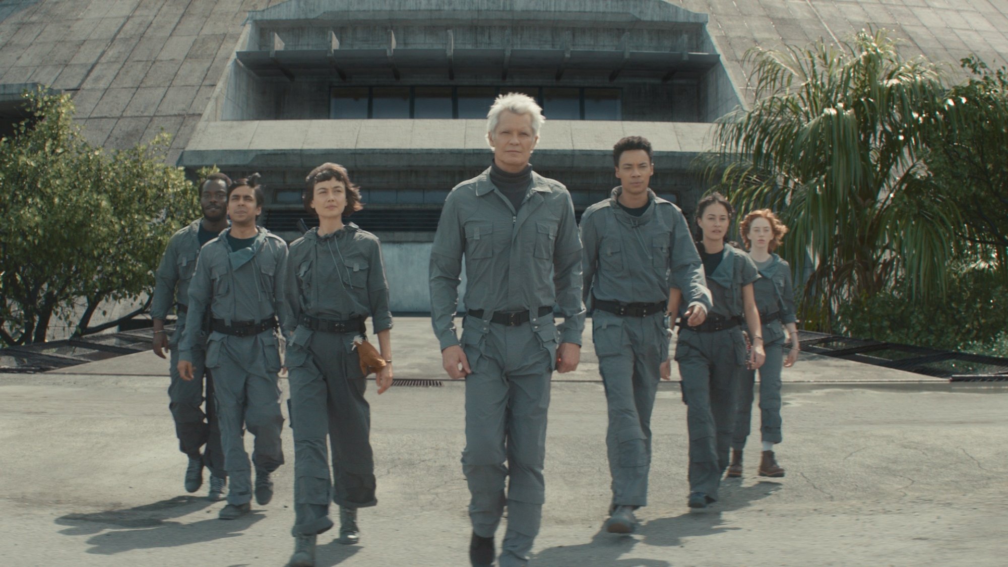 The cast of "Alien: Earth" walk in a V formation.